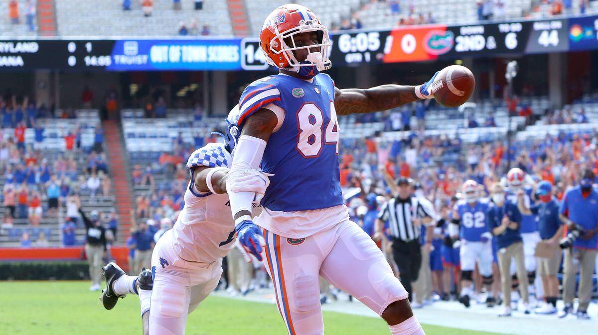 Florida Gators tight end Kyle Pitts (84) scores a touchdown during a football game against the Kentucky Wildcats at Ben Hill Griffin Stadium in Gainesville, Fla. Nov. 28, 2020. [Brad McClenny/The Gainesville Sun]