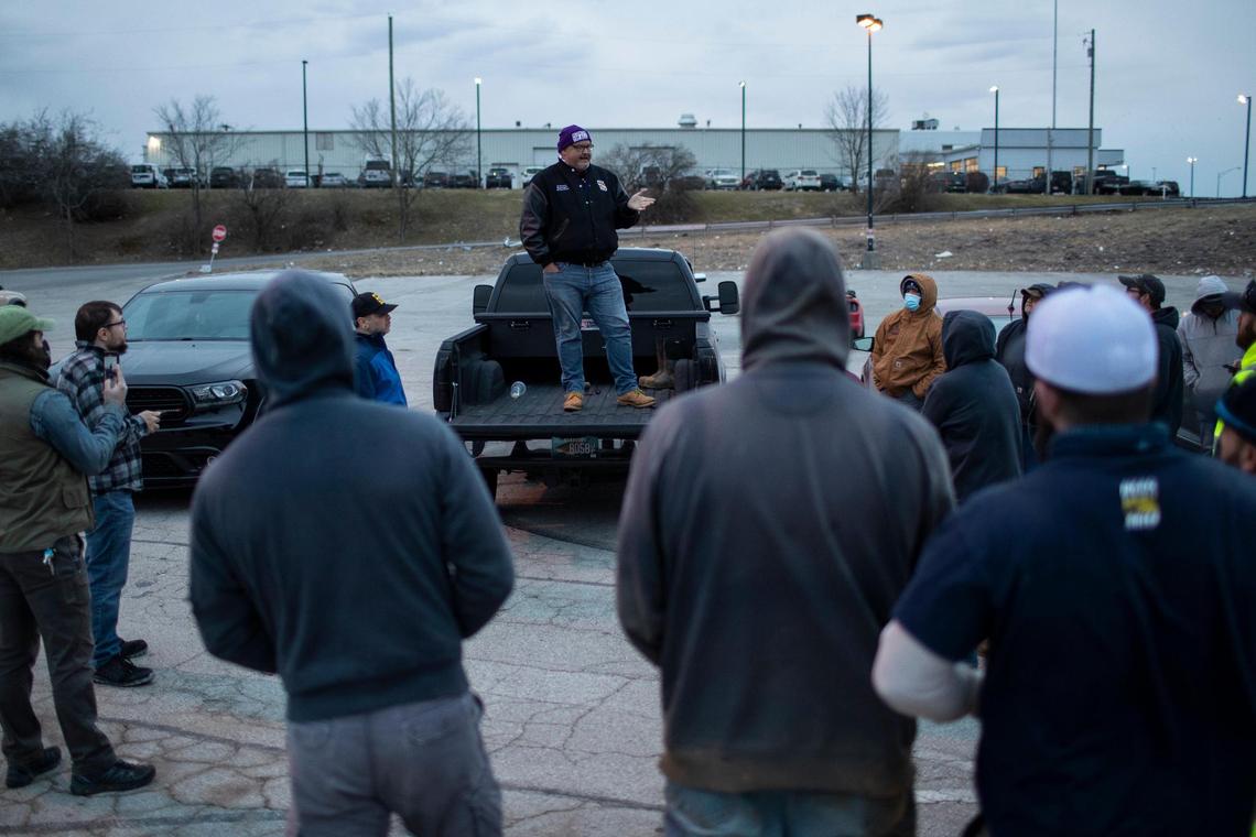 Bo Johnson, the Kentucky state director of the National Conference of Firemen and Oilers union, talks to members gathered for a rally in a parking lot off Richmond Road held while negotiations with Kentucky American Water were being voted on elsewhere in Lexington, Ky., Friday, February 11, 2022. The union members will not go on strike as of Friday night.