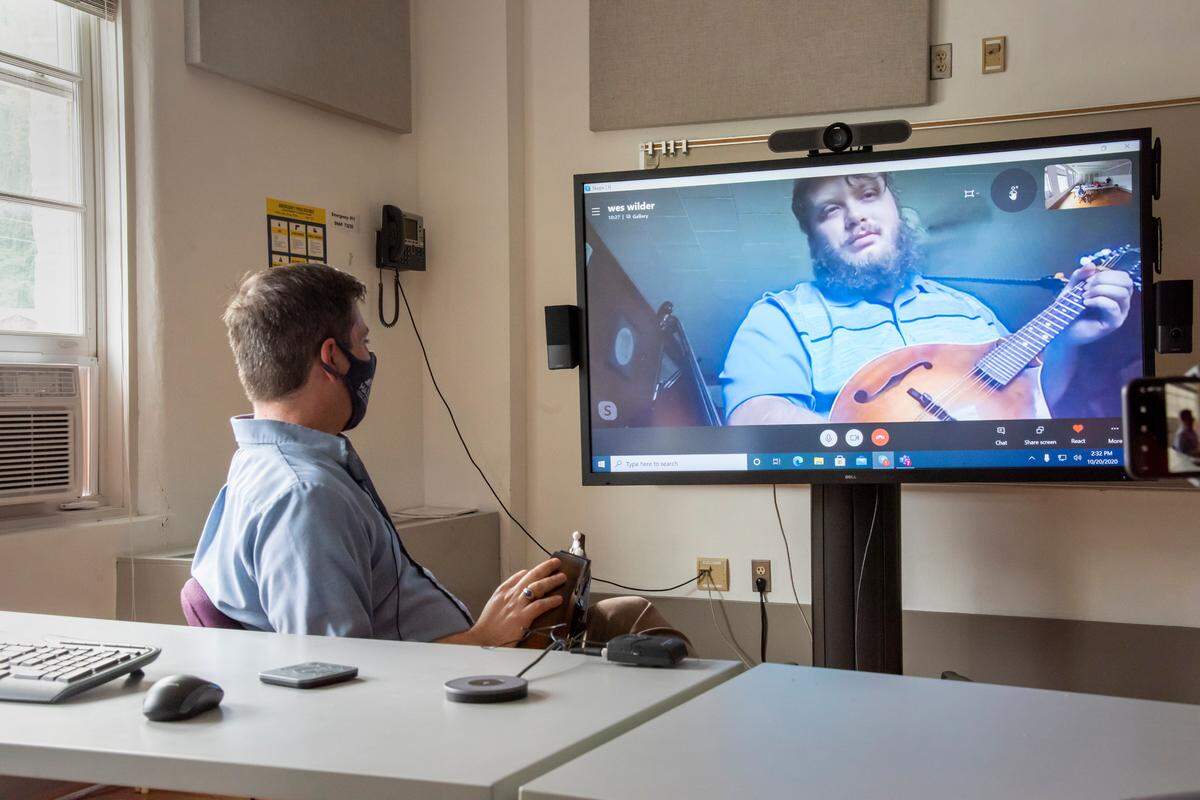 KSBTM Associate Professor Scott Napier instructs student and Tennessee resident Wes Wilder in a mandolin lesson.
