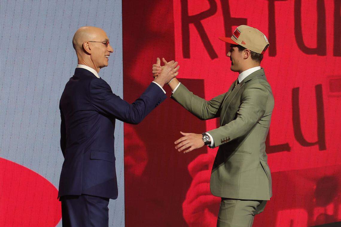 Jun 26, 2024; Brooklyn, NY, USA; Reed Sheppard shakes hands with NBA commissioner Adam Silver after being selected in the first round by the Houston Rockets in the 2024 NBA Draft at Barclays Center. Mandatory Credit: Brad Penner-USA TODAY Sports