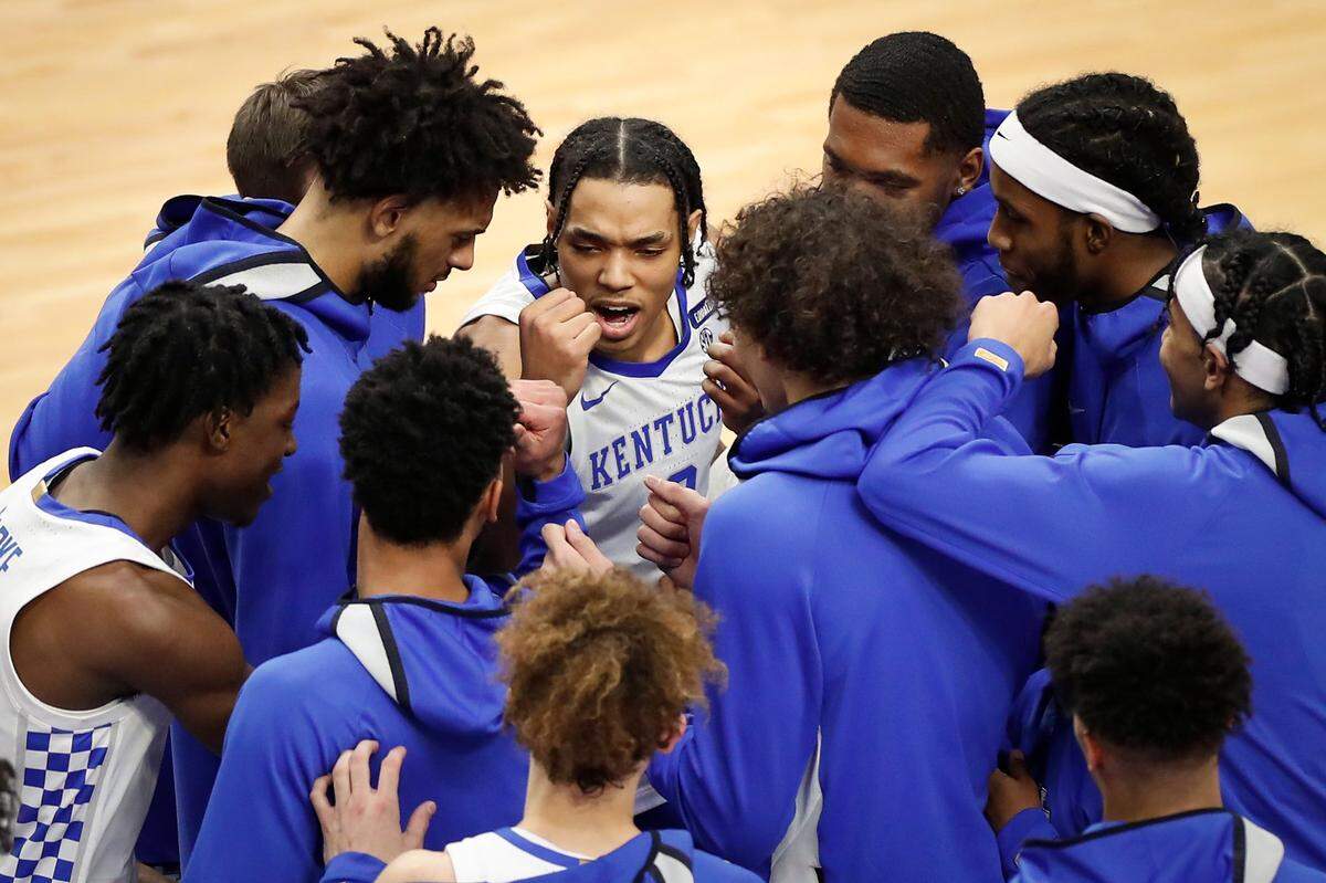 The Wildcats rallied around Brandon Boston before a game. Omar Cooper, Boston’s AAU coach, described the UK freshman as a team player, whether he’s on the floor or not. “He was one of the best bench guys I’ve ever had. He cheers for his teammates non-stop.”