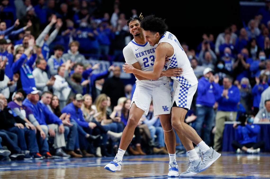 Former Kentucky forward Bryce Hopkins, left, celebrates with ex-teammate Jacob Toppin during a game in Rupp Arena last season.
