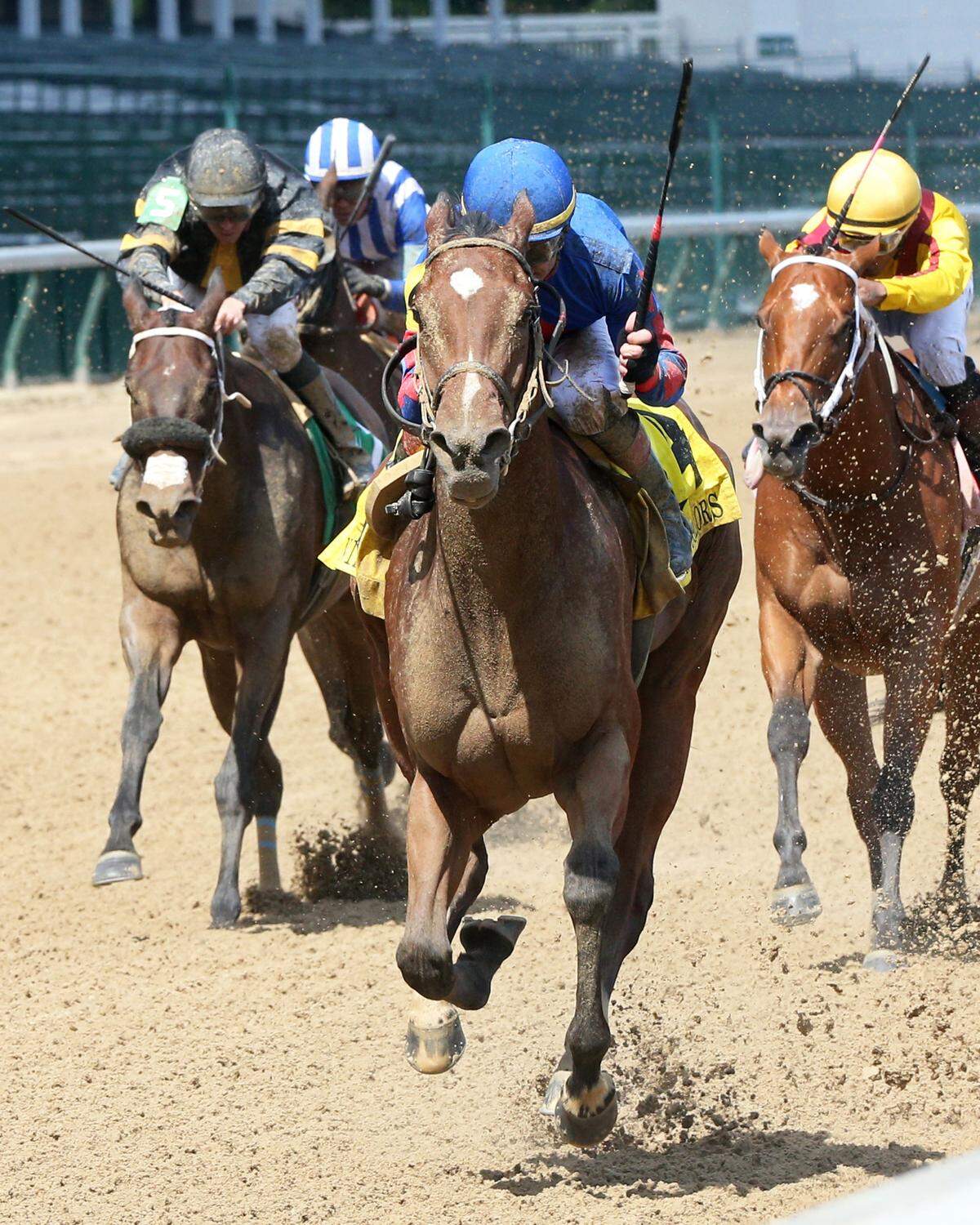 Bell’s the One, in the lead with Corey Lanerie aboard, won the Grade 3 Winning Colors at Churchill Downs on Saturday.