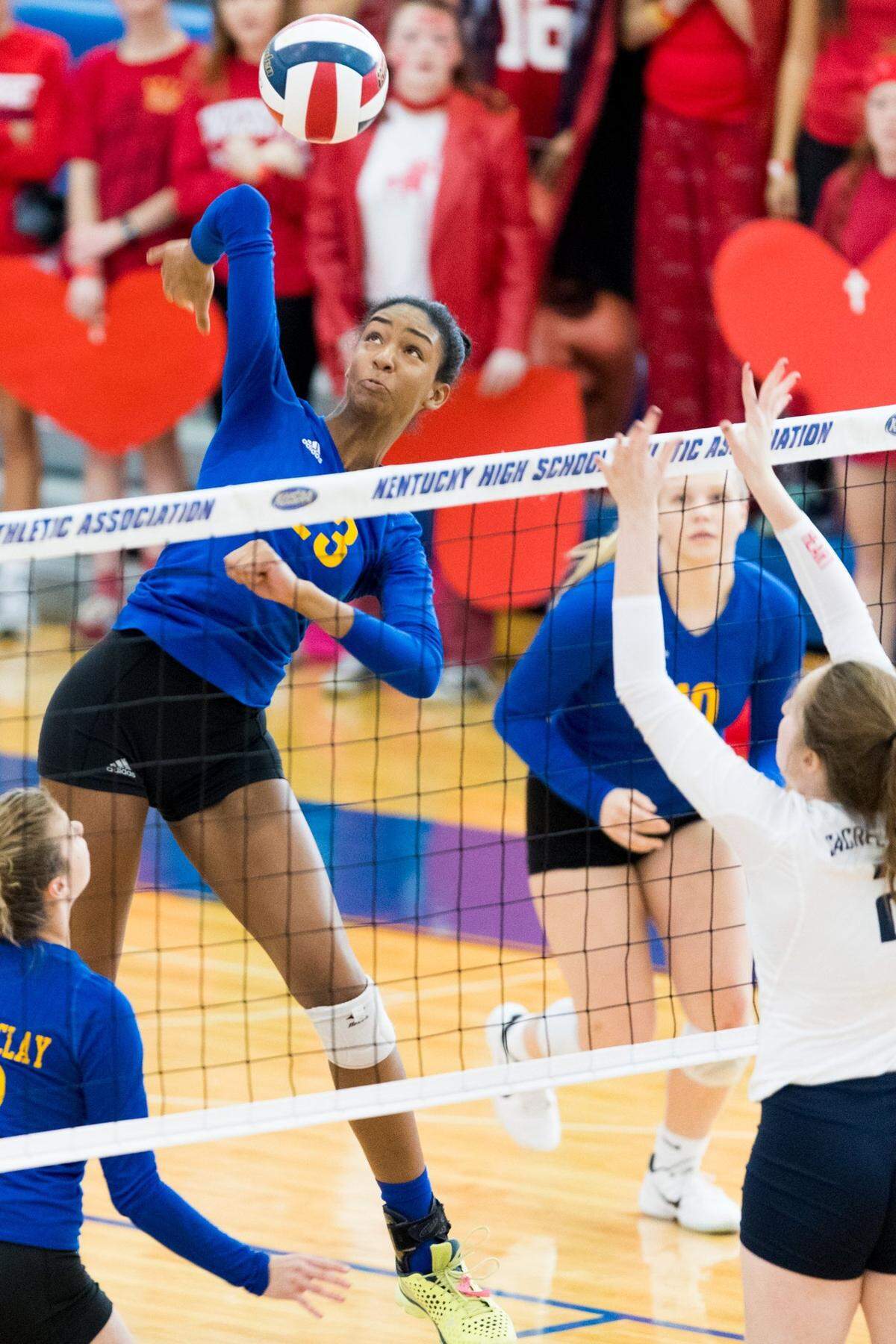 Kaitlyn Hord spiked the ball during the first set of the 2016 state title game. Sacred Heart Academy defeated Henry Clay, 3-1, to win the KHSAA championship.