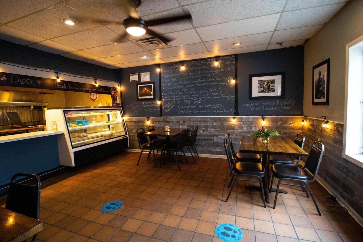 Deli counter and dining area at Liam restaurant within Silver Streak Market on Versailles Road.