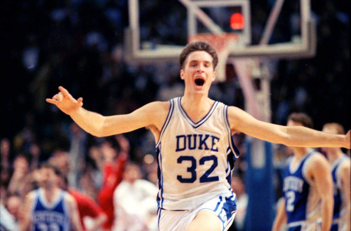 Duke’s Christian Laettner celebrated after hitting the shot that gave the Blue Devils a 104-103 overtime victory over Kentucky in the 1992 NCAA Tournament East Region finals.