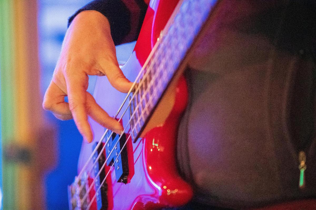 Co-owner of Nitrosonic Studios Leah Arrington plays her bass guitar on Friday, Jan. 29, 2021, at Nitrosonic Studios in Lexington, Kentucky.