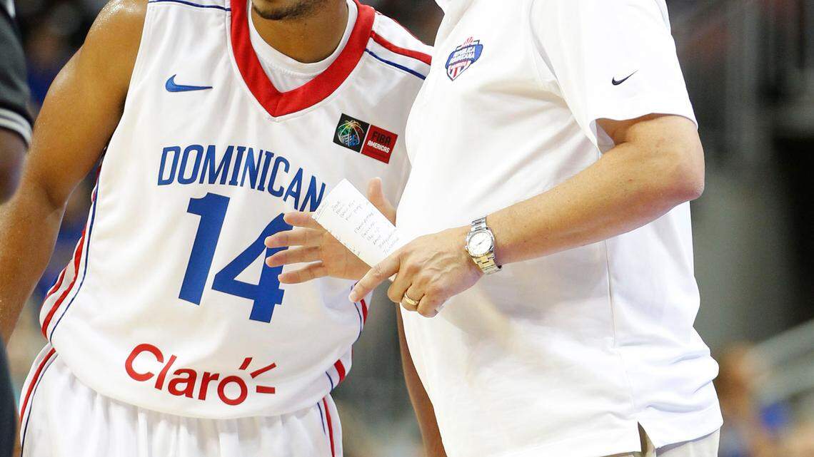 John Calipari's talked with Ronald Ramon,14, as his 
Dominican Republic National Team played  against a team of former UK players who are now professionals  on Tuesday  August 16, 2011 in Louisville, Ky.  Photo by Mark Cornelison | Staff