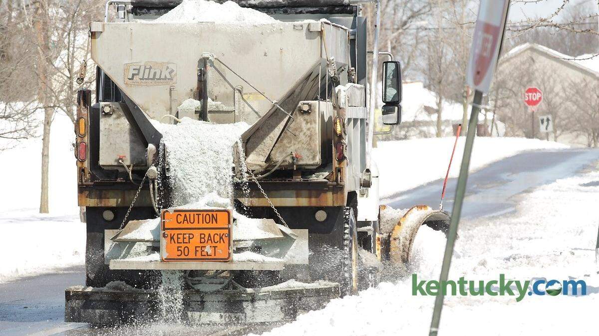 Cindy Bishop's plow truck dropped salt on Elm Tree Lane in downtown  Lexington, Ky., on Feb. 17, 2015. Photo by Pablo Alcala | Staff