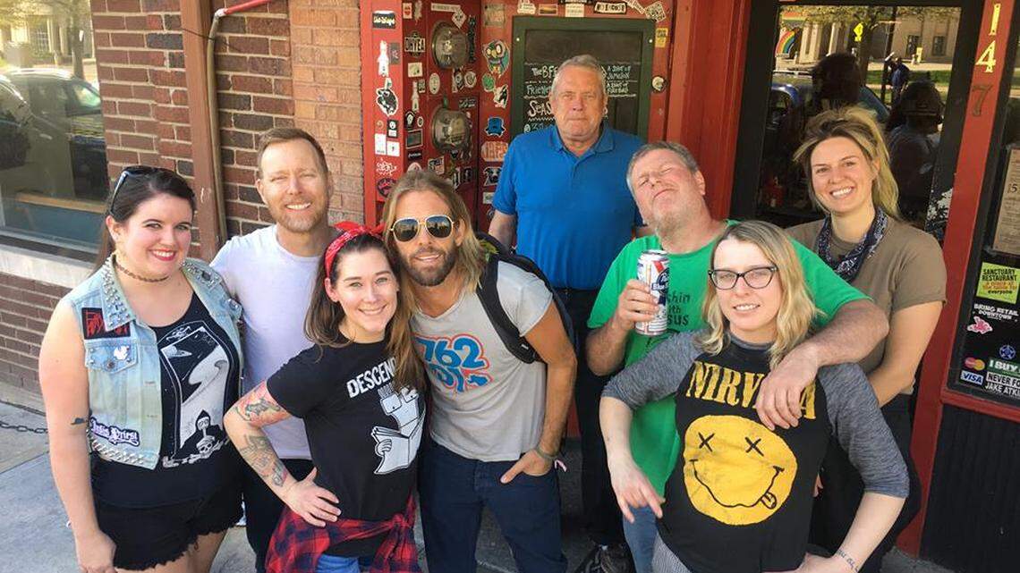 Members of the Foo Fighters, in town for a concert tonight at Rupp Arena, stopped by the Sidebar Grill on North Limestone on Monday for a burger after renting bikes from Bicycle Face on Short and Elm Tree.