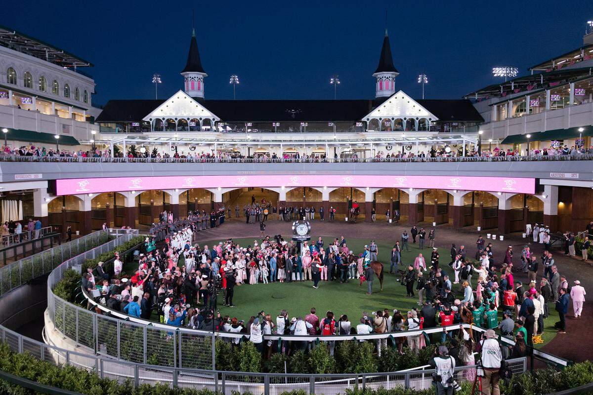 Always a Runner and her connections celebrate in the paddock after the horse won the 2026 Kentucky Oaks on Friday, May 1, 2026, at Churchill Downs in Louisville, Kentucky.