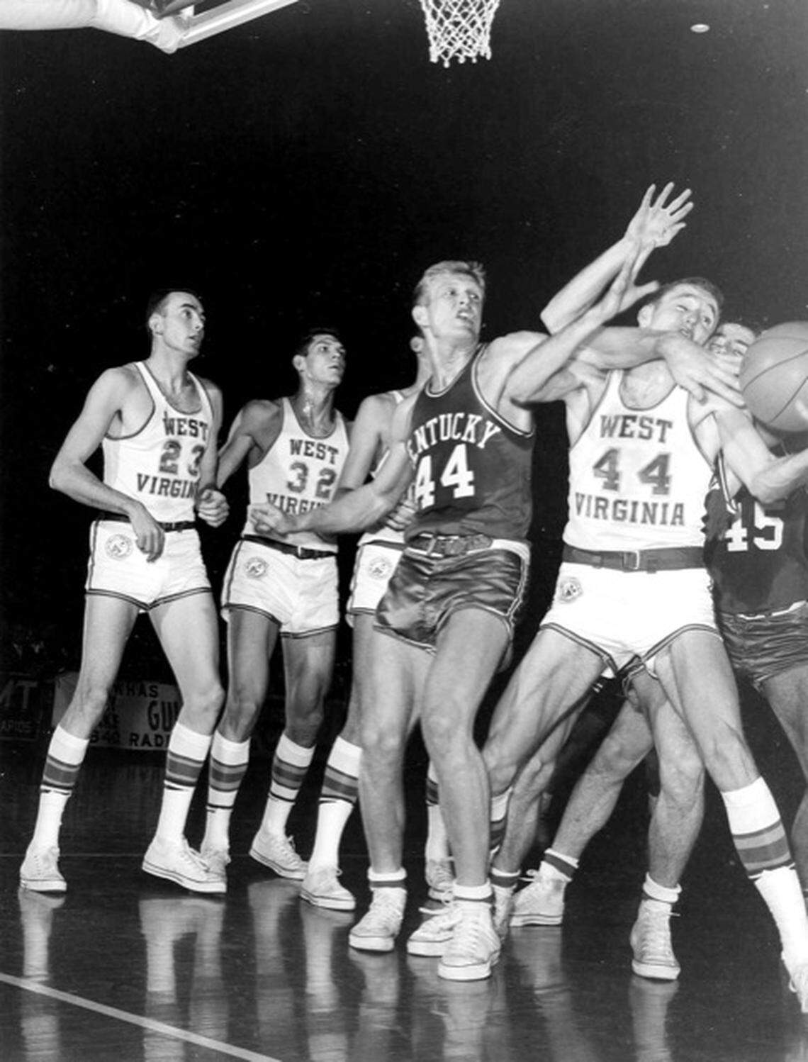 Kentucky’s Cotton Nash battles for a loose ball during a 1962 game against West Virginia in Memorial Coliseum. “Cotton was a tremendous athlete. Really good speed for a guy his size,” Nash’s former UK teammate Larry Conley said in 2020. “He had a lot of strength, (and) great moxie about how to play the game.”