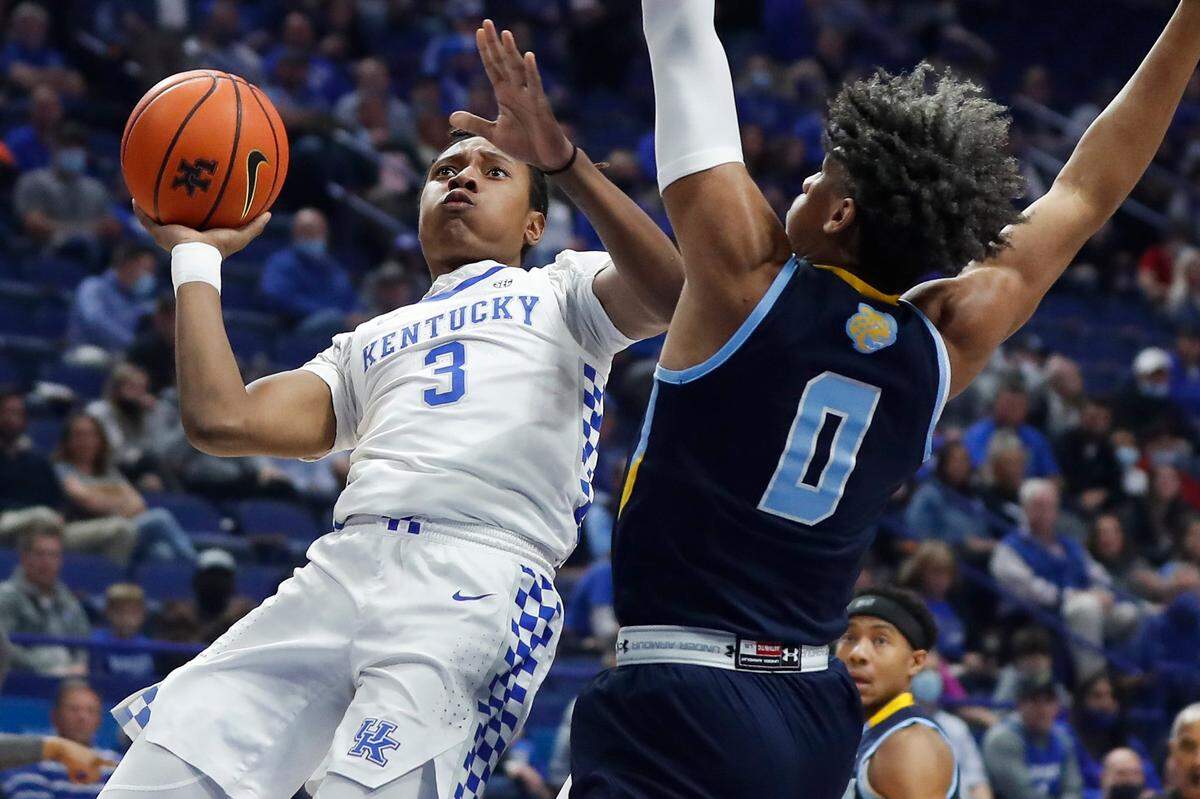 Kentucky Wildcats guard TyTy Washington Jr. (3) shoots against Southern University Jaguars forward Terrell Williams (0) during a game at Rupp Arena in Lexington, Ky., Tuesday, Dec. 7, 2021.