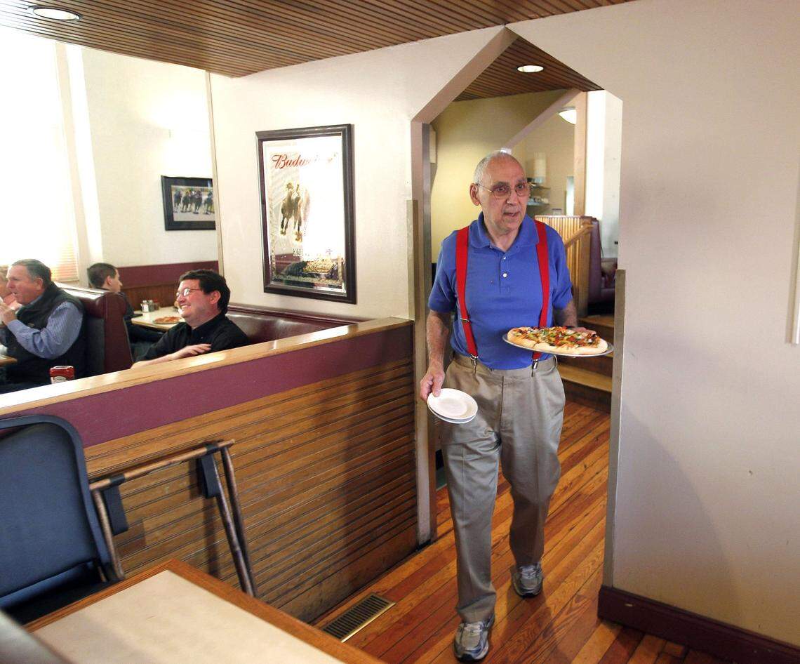 Joe Bologna served a pizza he made at his Joe Bologna’s restaurant, 120 West Maxwell St. in Lexington., Ky.,Wednesday, March 13, 2013. Joe Bologna’s restaurant is 40 years old. Photo by Charles Bertram | Staff