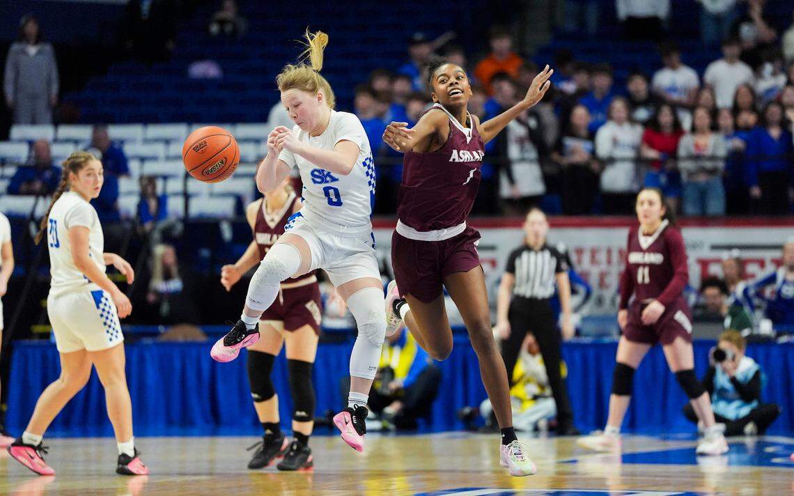 Simon Kenton guard Brynli Pernell and Ashland Blazer power forward Alexis Troxler collide in midair while they both attempt to chase down loose ball during the Clark’s Pump-N-Shop Girls’ Basketball Sweet 16 tournament as Simon Kenton plays Ashland Blazer at Rupp Arena on Thursday, March 12, 2026, in Lexington, Ky. Photo by Israel Schill