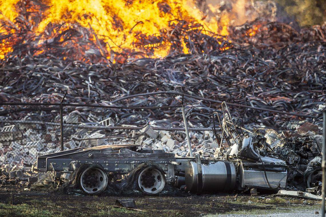 A Jim Beam warehouse facility in Woodford County caught fire Tuesday night and flmaes were still visible eight hours later.