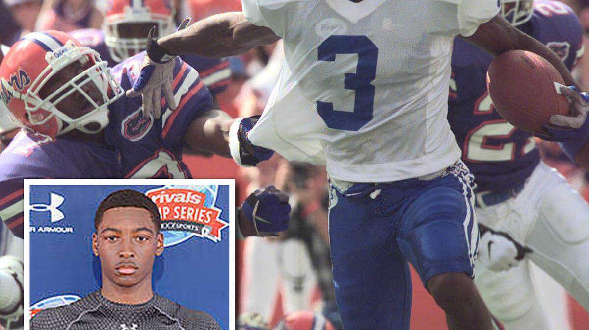 Russ Yeast, inset, is son of Craig Yeast shown eluding the Fla. defense (Reggie Davis) on his way to KY's first TD of the game, 1st quarter, Gainesville, Fla., Saturday, September 26, 1998.
