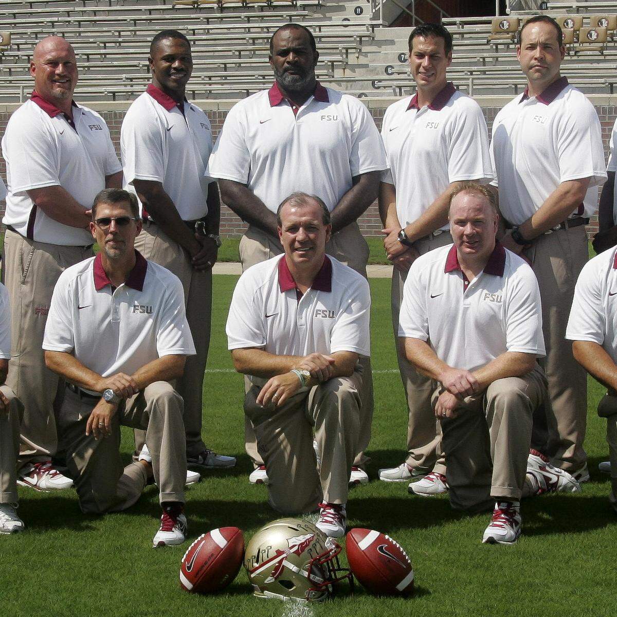 Mark Stoops, front row right, was defensive coordinator under head coach Jimbo Fisher, front row center, when this coaching staff photo was taken at Florida State before the 2012 season. Stoops left FSU after that season to become head coach at Kentucky. Fisher left the Seminoles after last season to become head coach at Texas A&M. Their two teams will meet Oct. 6 this season in College Station, Texas. Also pictured are current UK offensive coordinator Eddie Gran, front row left, who was then the Seminoles’ running backs coach, and former UK defensive coordinator D.J. Eliot, back row second from right, who was then FSU defensive ends coach.