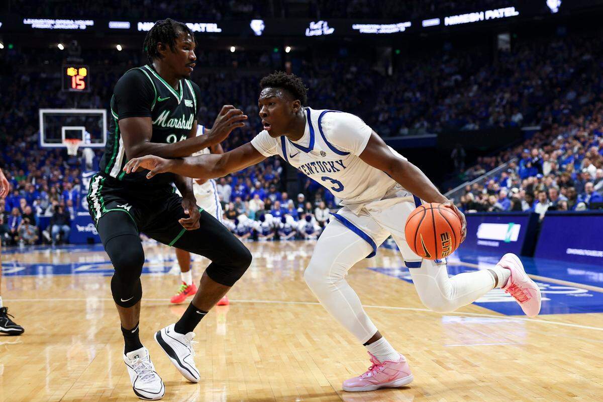 Kentucky’s Adou Thiero (3) dribbles against Marshall during Friday’s game at Rupp Arena.