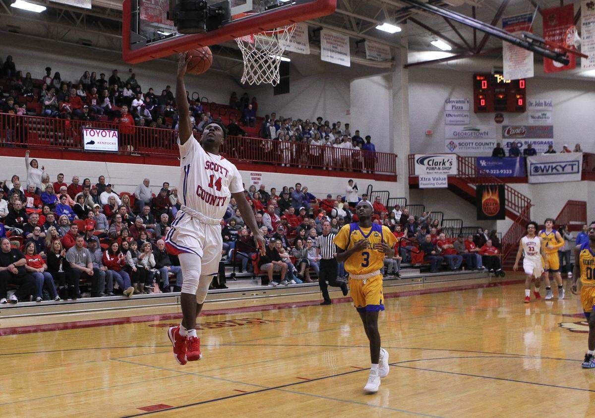 Scott County’s Glenn Covington scored 26 of his 33 points in the first half of the Cardinals’ win against Henry Clay on Friday.