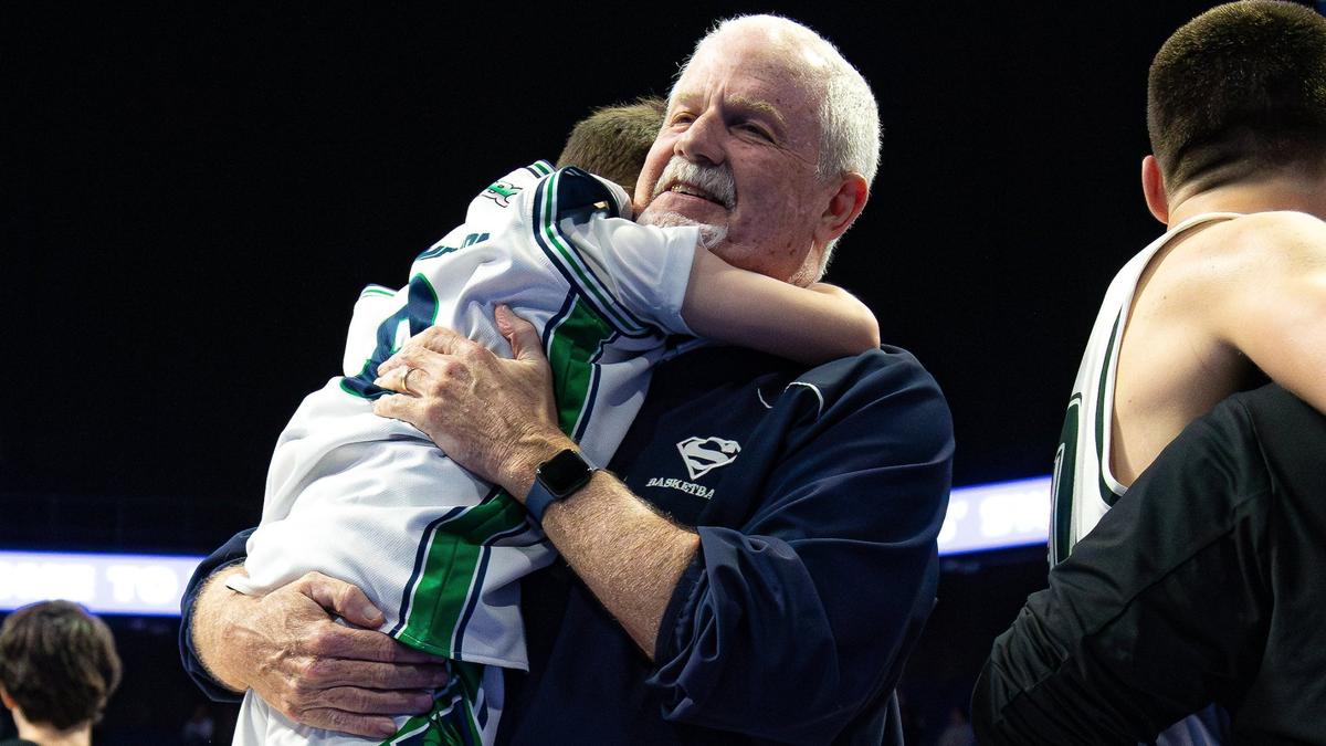 South Oldham coach Steven Simpson celebrates after his team's win against Jeffersontown in the Sweet 16 quarterfinals at Rupp Arena on Friday.