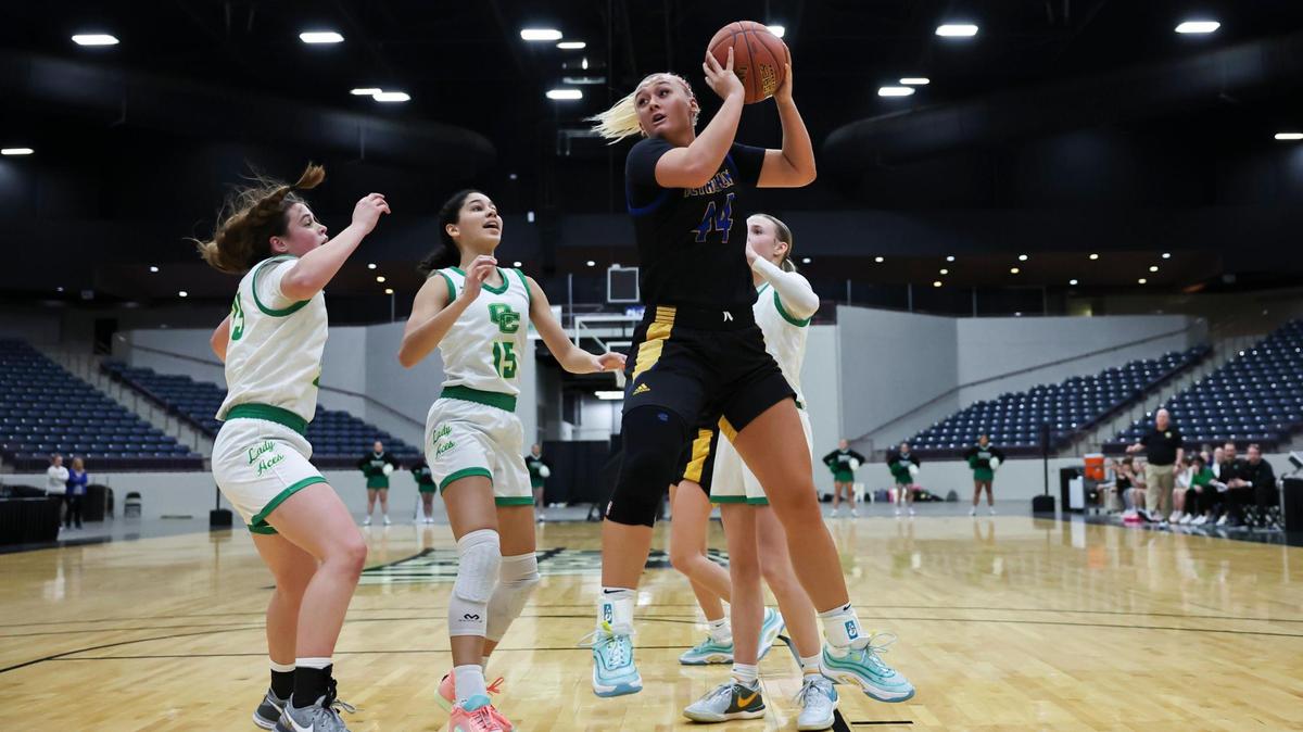 Bethlehem junior Leah Macy (44) gets a rebound against Owensboro Catholic during the Kentucky All “A” Classic at Corbin Arena in January. Macy, who helped lead Mercy Academy to the Sweet 16 last year, now stars for 5th Region champion Bethlehem.