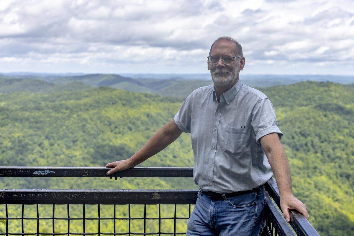 Lexington Herald-Leader reporter Bill Estep is photographed at the Bullock Overlook in Kingdom Come State Park in Harlan County, Ky., on Tuesday, June 17, 2025.