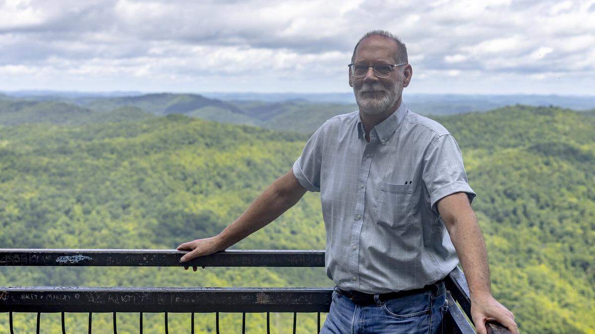 Lexington Herald-Leader reporter Bill Estep is photographed at the Bullock Overlook in Kingdom Come State Park in Harlan County, Ky., on Tuesday, June 17, 2025.