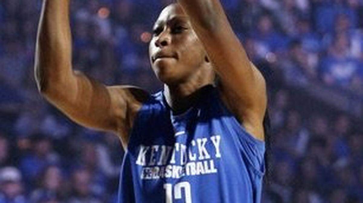 Kentucky forward Evelyn Akhator (13) shots around during Big Blue Madness at Rupp Arena Friday, Oct. 16, 2015 in Lexington, Ky. Photo by Amy Wallot