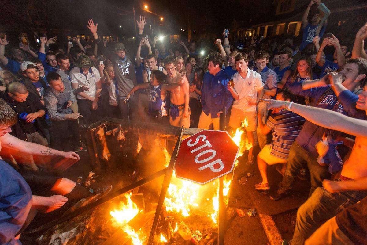 Crowds gather to celebrate UK’s, 74-69 win over UofL, Saturday, March 29, 2014 at the State Street Area in Lexington. Photo by Jonathan Palmer