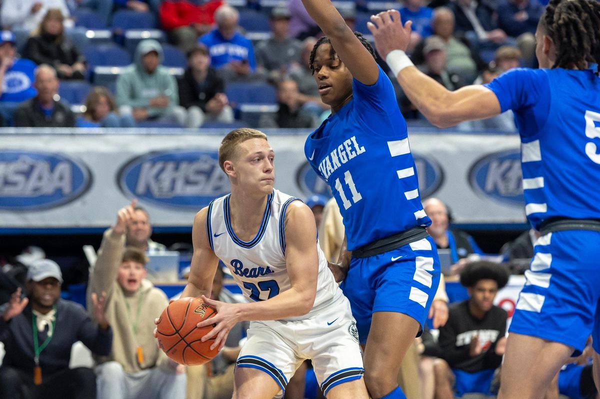 Evangel Christian’s Isaiah Chitapa (11) guards Butler County’s Ty Price (22) during Thursday’s first-round game in Rupp Arena. Price, who averages 29.6 points per game, was limited to 12.