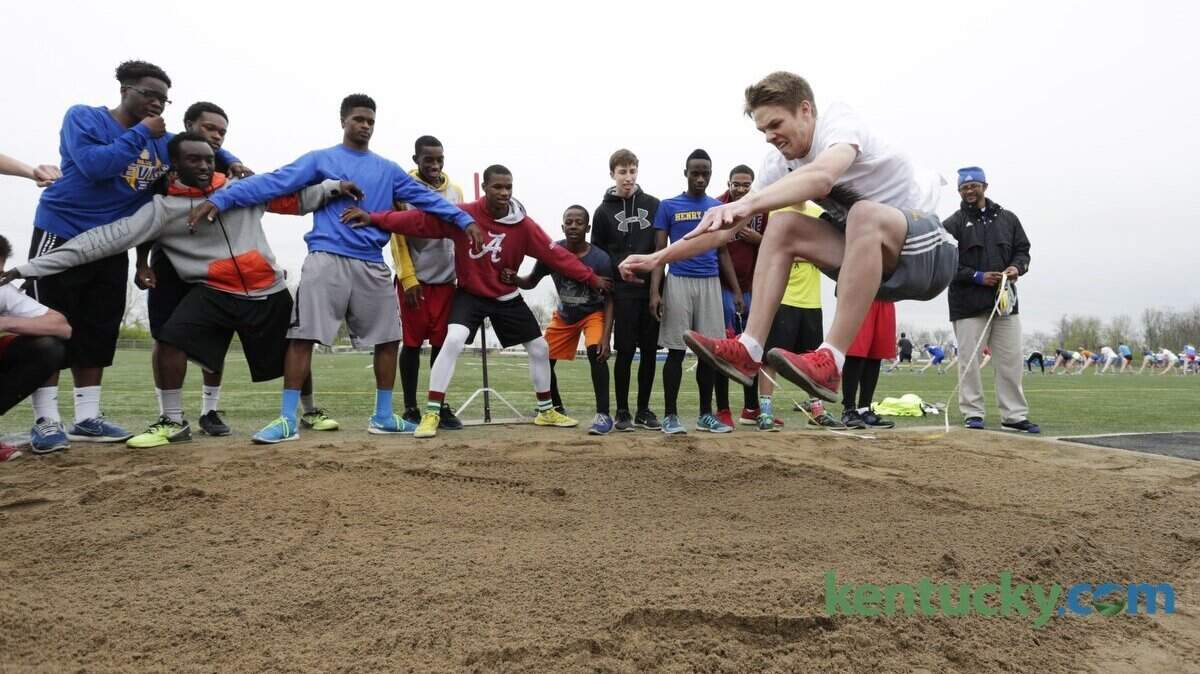 Jaron Brooks tried the standing long jump during track and field practice at Henry Clay High School in Lexington, Ky., on April 15, 2015. Brooks is the leading high school high-jumper in the nation. Photo by Pablo Alcala | Staff