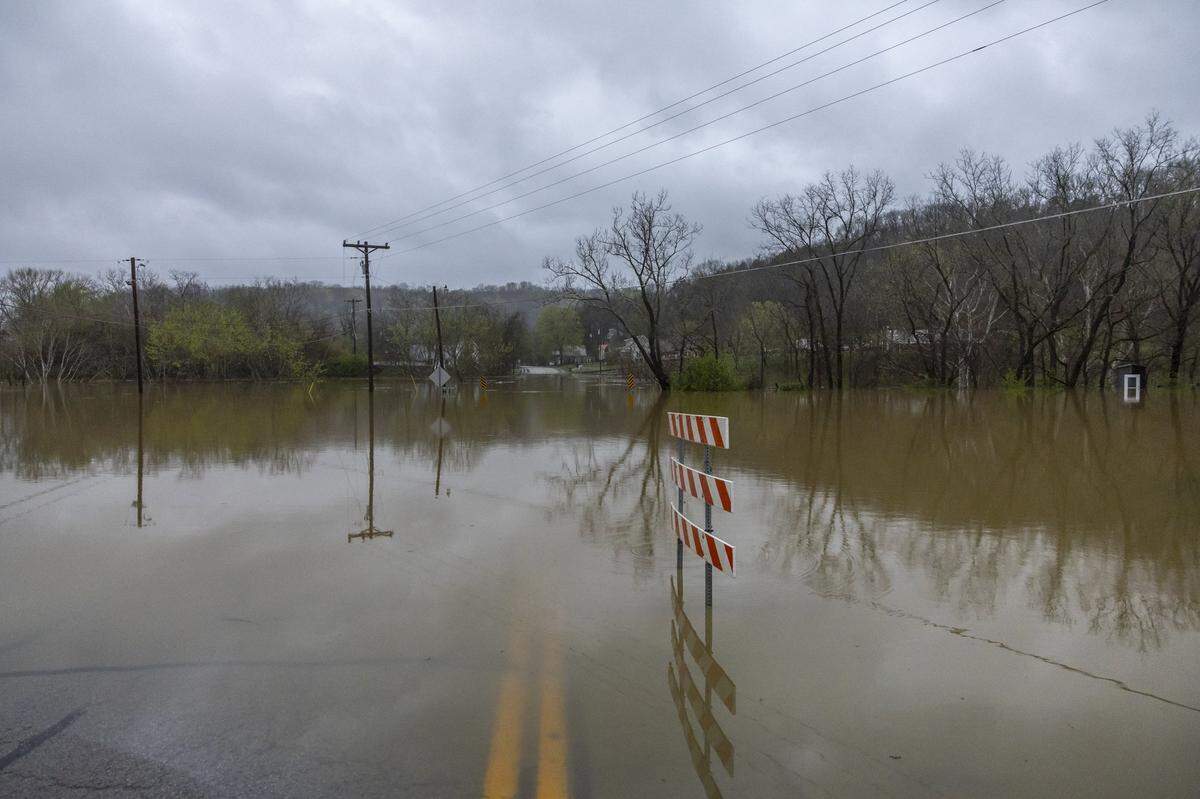 Monterey Pike, a road into Monterey, Ky., is flooded on Sunday, April 6, 2025.