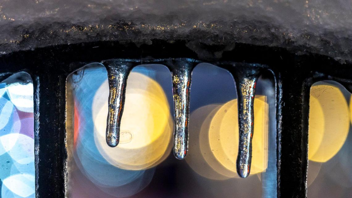 Ice hangs from a bike rack in downtown Lexington, Ky., on Monday, Jan. 6, 2025.