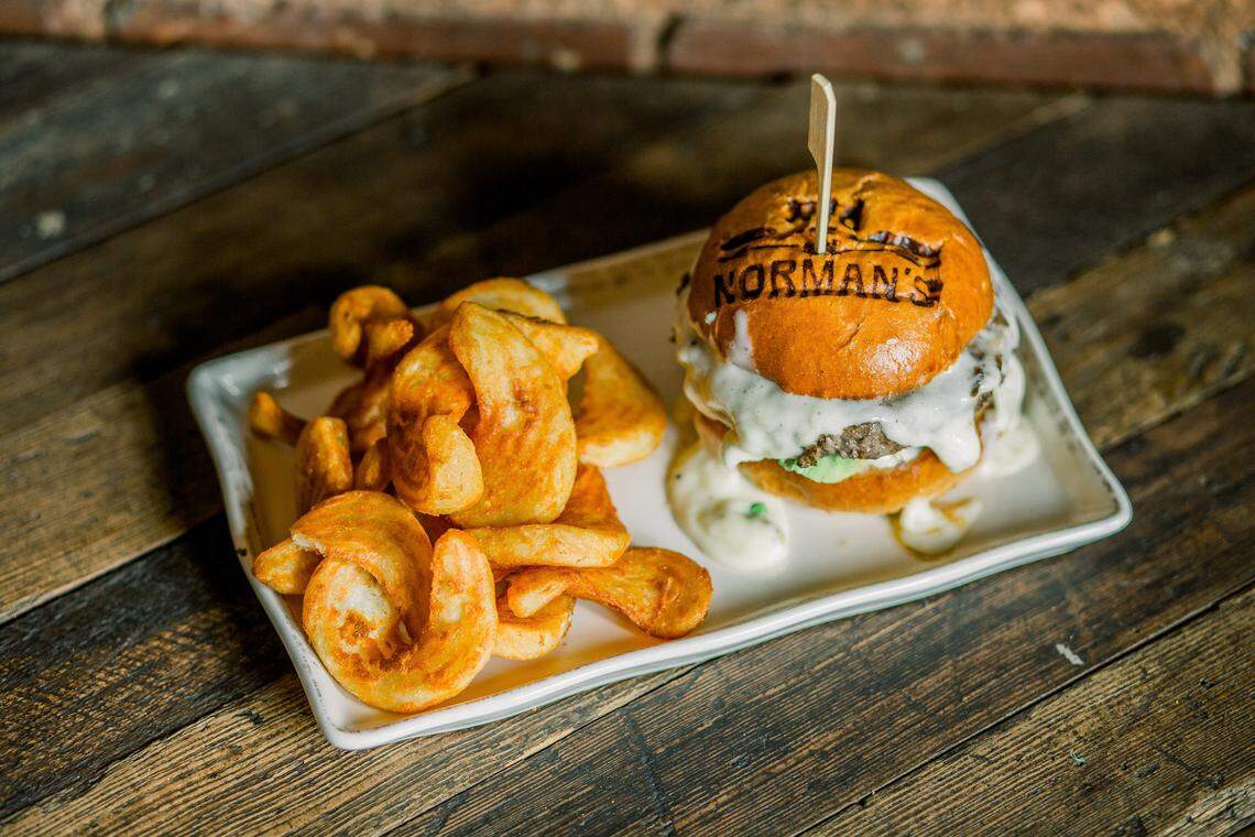 Nic & Norman’s features a selection of burgers, including the Mexican Burger made with a blend of ground chuck, short rib and brisket patty, grilled jalapeno, cilantro-lime mayo and melted queso, served with sidewinder fries.