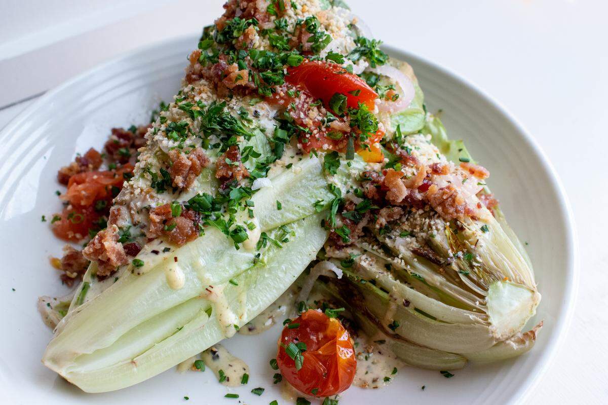 Chef Ouita Michel’s restaurant Honeywood in Lexington has served this version of a kilt salat, or wilted lettuce salad.