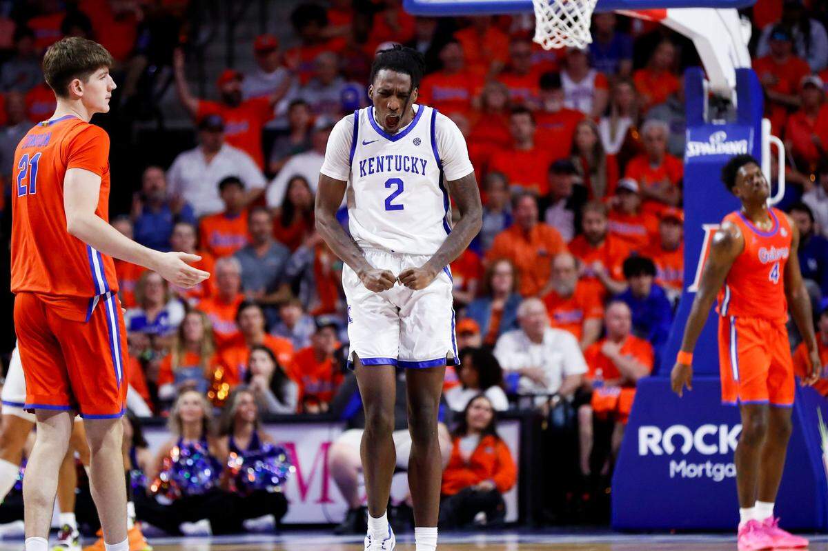 Kentucky forward Aaron Bradshaw (2) celebrates scoring against Florida during Saturday’s game at the Stephen C. O’Connell Center in Gainesville. He had 10 points and seven rebounds in the Wildcats’ win.