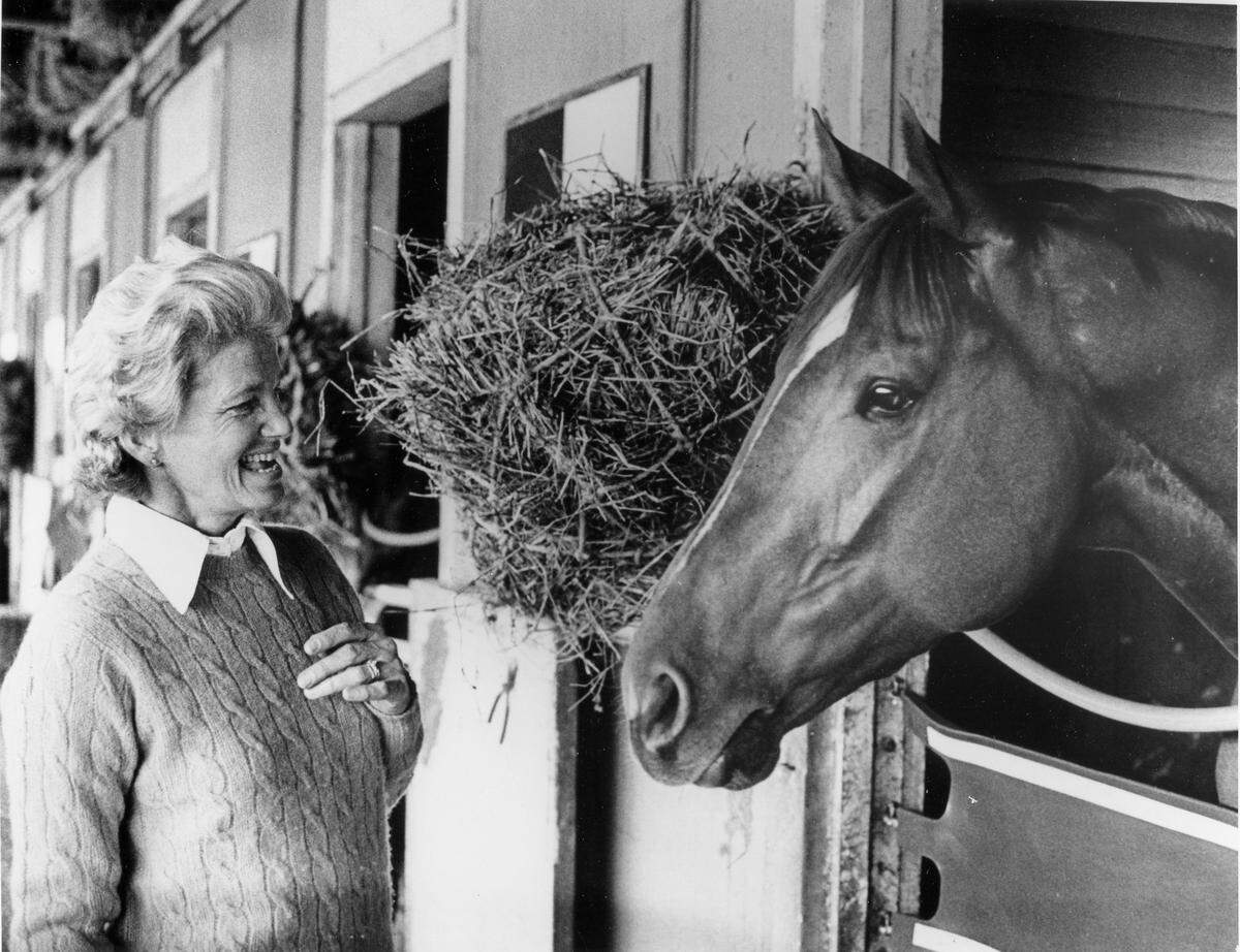 Penny Chenery and Secretariat at the Meadow Stable Barn at Belmont, 1973.  Photo courtesy of Secretariat.com and NYRA