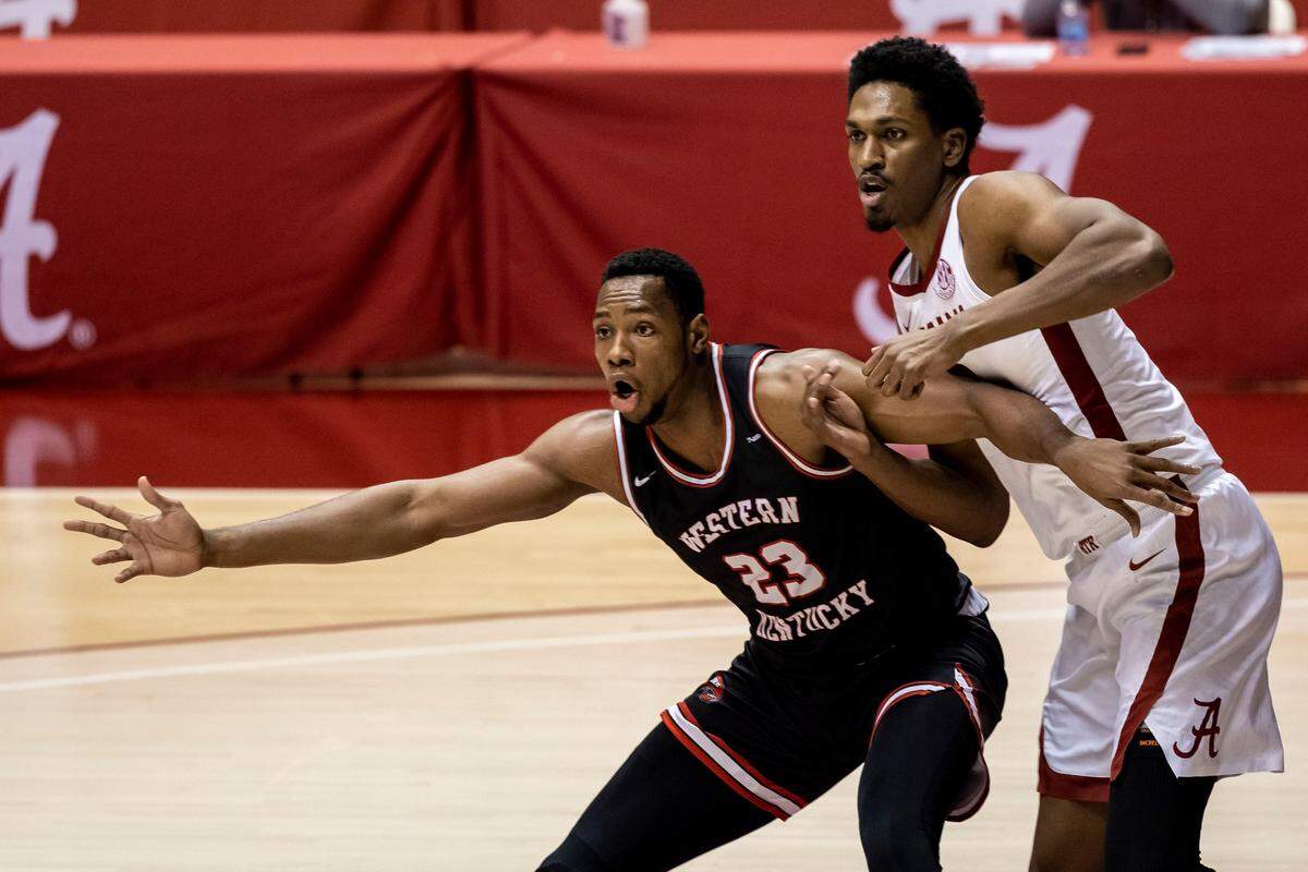 Western Kentucky center Charles Bassey (23) is trying to lead the Hilltoppers to their first NCAA Tournament appearance since 2013.