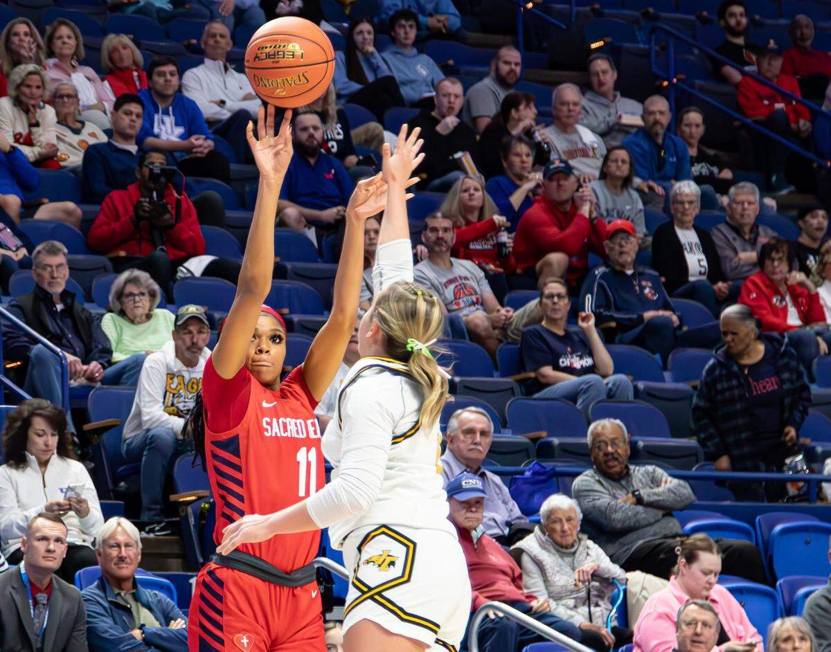Sacred Heart’s ZaKiyah Johnson (11) scored a game-high 26 points in Thursday’s win over Johnson Central and also had 10 rebounds, five assists and five steals.