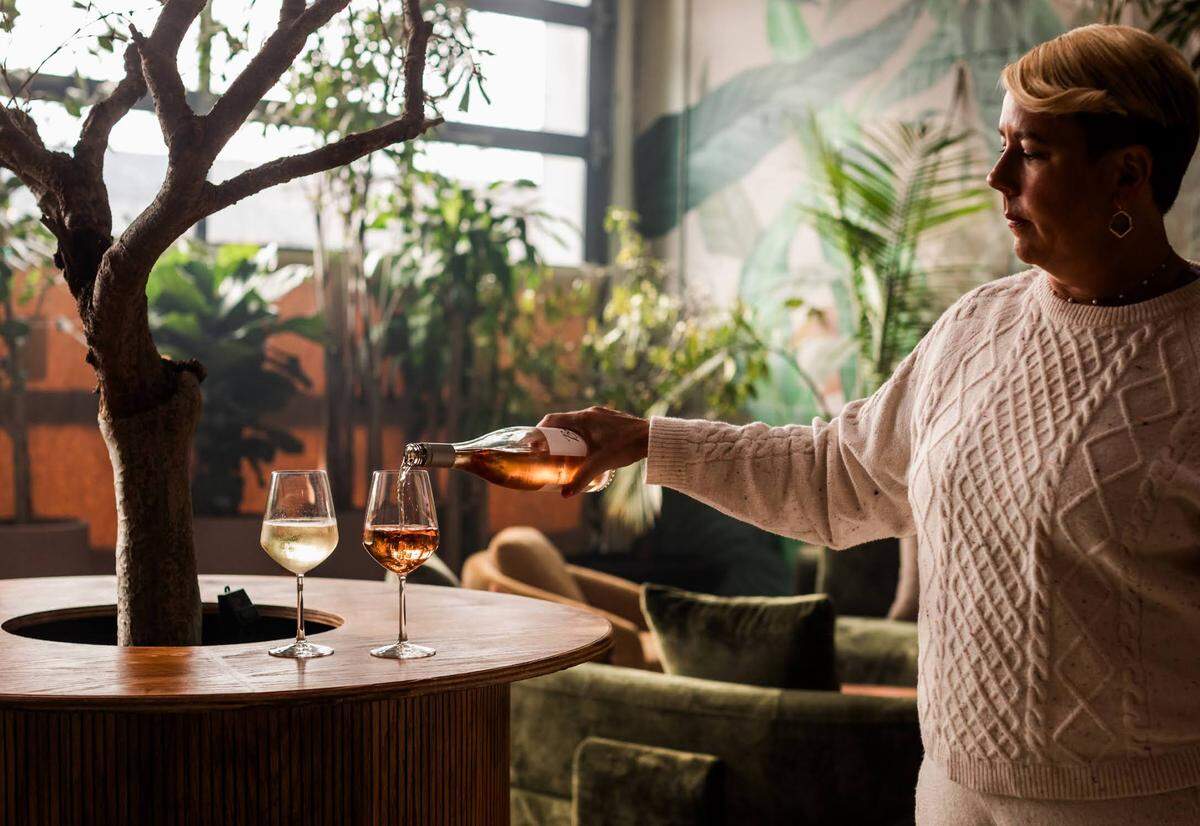 Erin Goins pours wine in The Willow, a new spot coming to the Warehouse Block on National Avenue with a serene vibe.