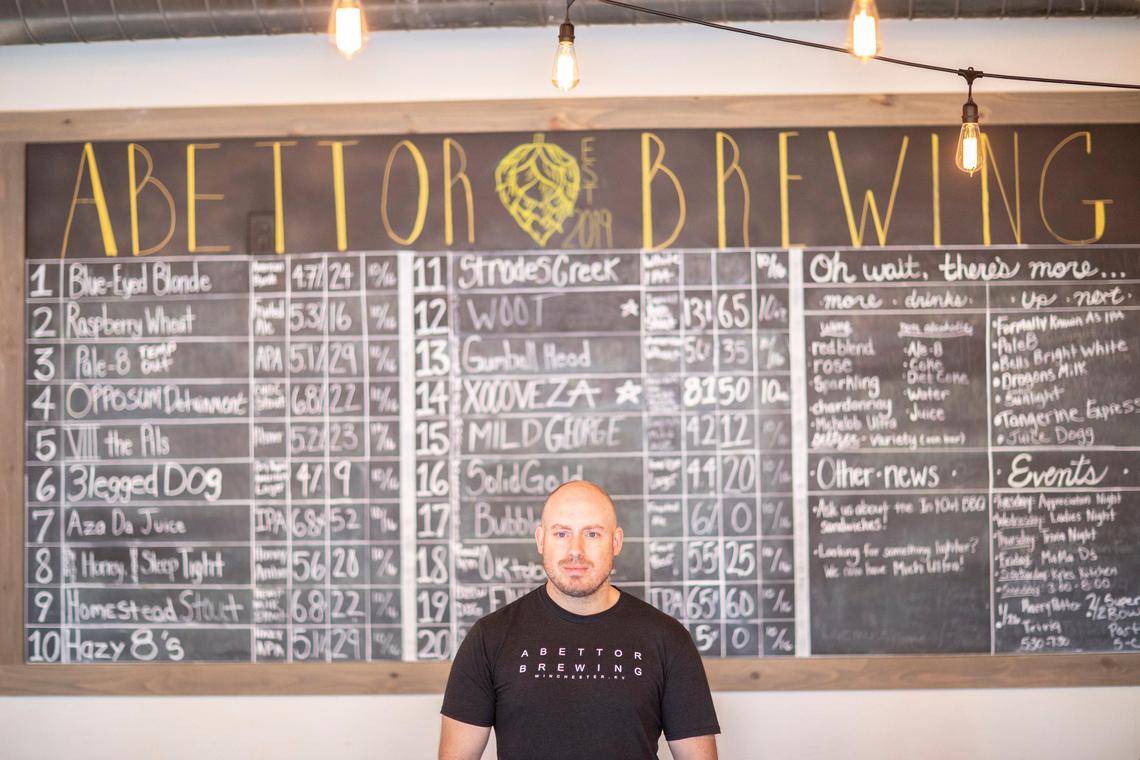Tyler Montgomery, Abettor Brewing founder, at his Winchester brewery. Currently they offer 20 beers on tap, 10 of which are Abettor originals.
