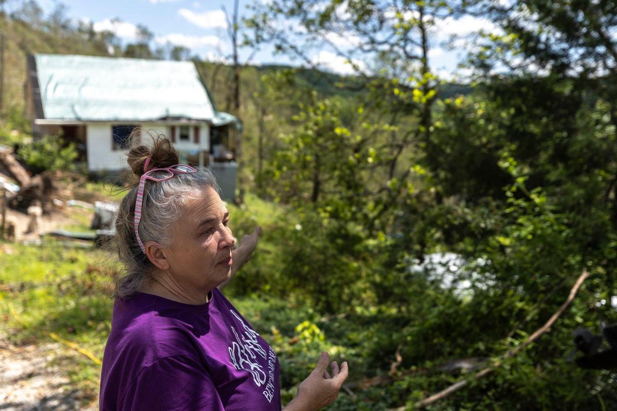 Tammy Watkins, whose home near Mt. Victory, Ky., was damaged by a tornado, is photographed on Thursday, April 22, 2025. A violent storm system ripped across Kentucky, destroying homes and businesses on May 16.