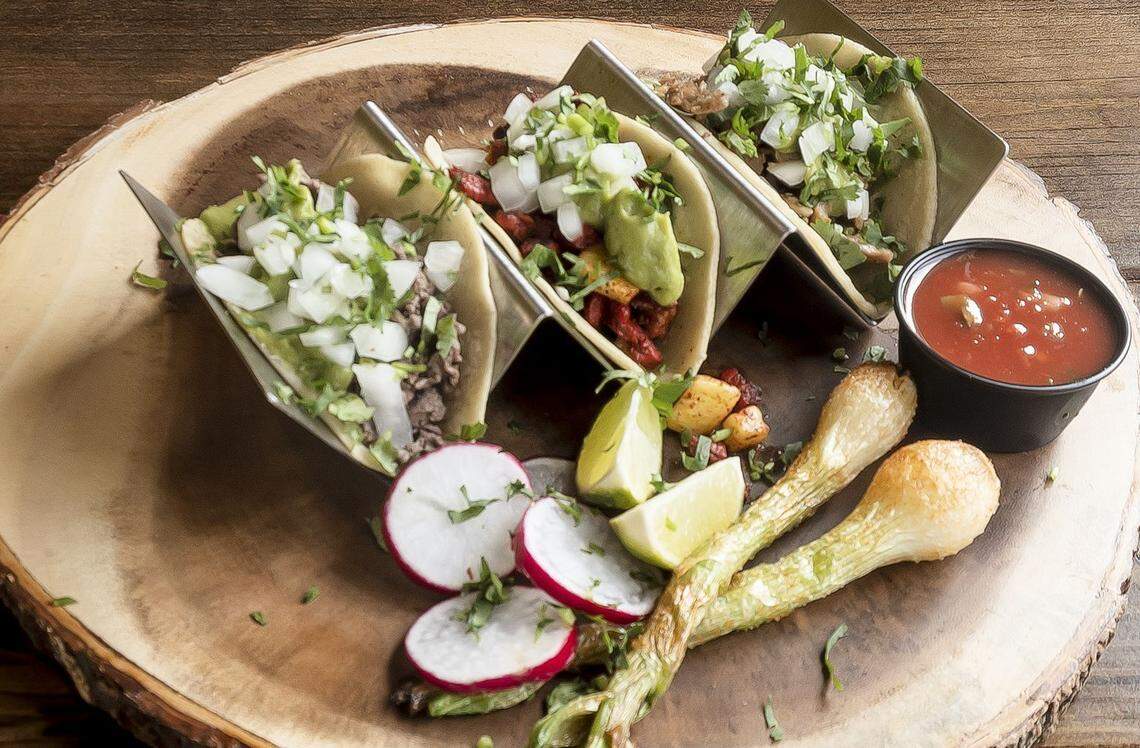 Tijuana Style Street Tacos from Bandido Taqueria Mexicana come in either carne asad, pollo asado, carnitas or Maui Wowie style with pork.