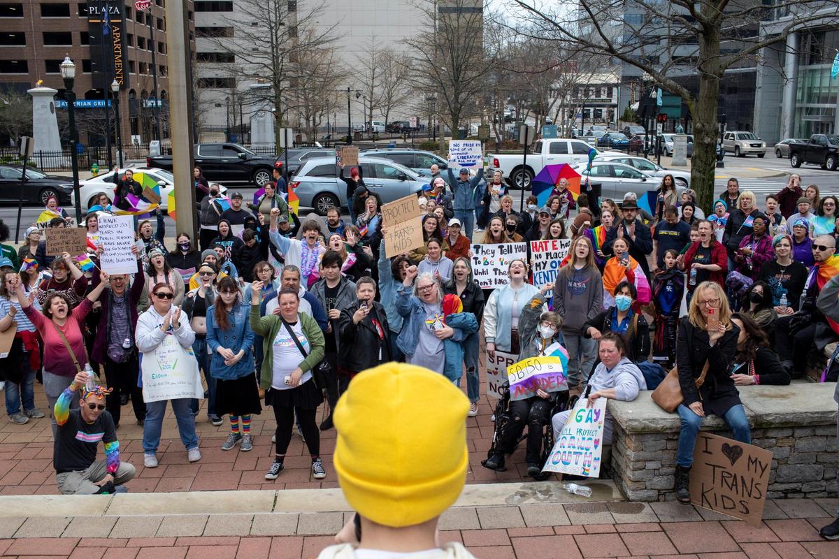 People gather for a rally organized by LGBTQ youth and adults in opposition to Senate Bill 150 and also to celebrate Trans Day of Visibility in Lexington, Ky., Friday, March 31, 2022.