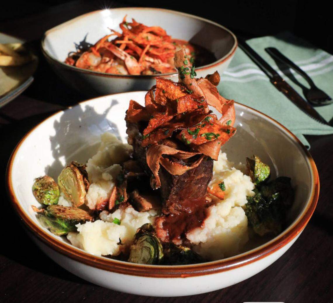 Braised short rib, ($41) with roasted shallot mashed potato, honey Brussel sprouts, crispy root vegetables and braising jus from Millstone, a new restaurant with a Kentucky-influenced menu that is now open in Dudley Square.
