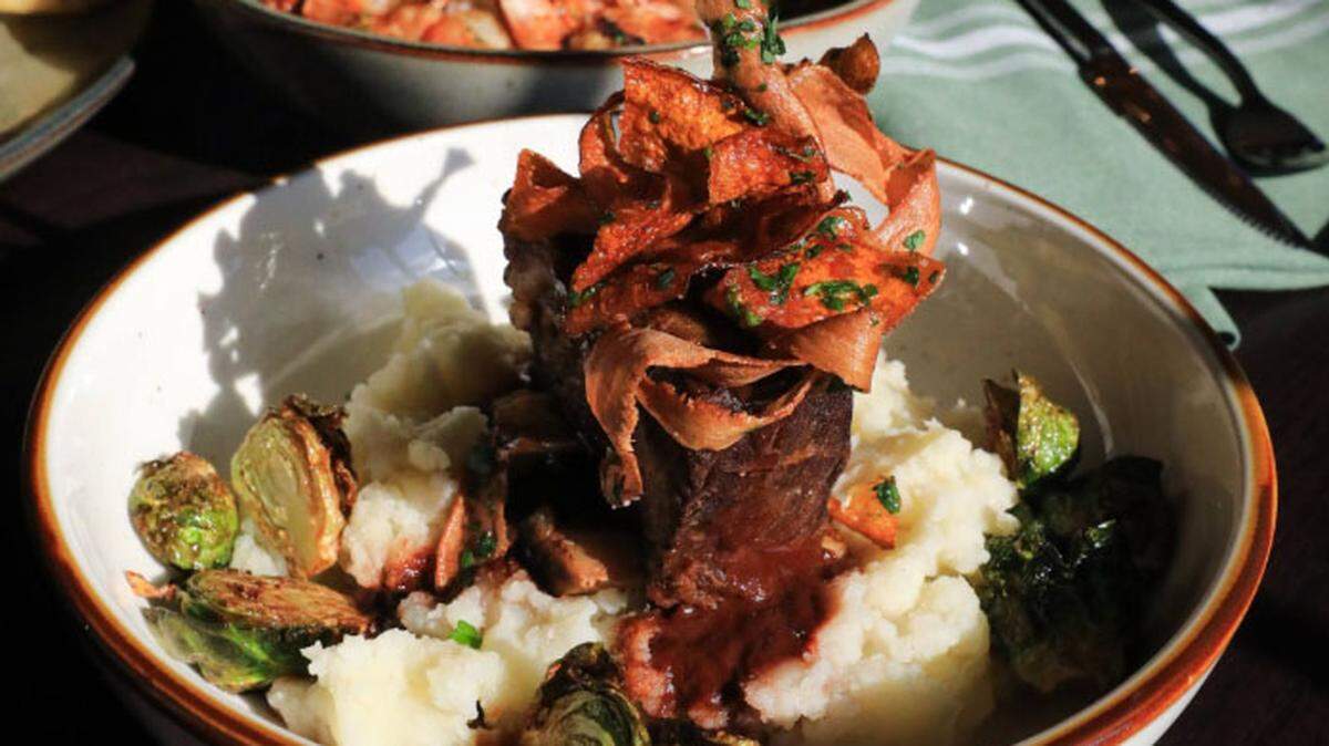 Braised short rib, ($41) with roasted shallot mashed potato, honey Brussel sprouts, crispy root vegetables and braising jus from Millstone, a new restaurant with a Kentucky-influenced menu that is now open in Dudley Square.