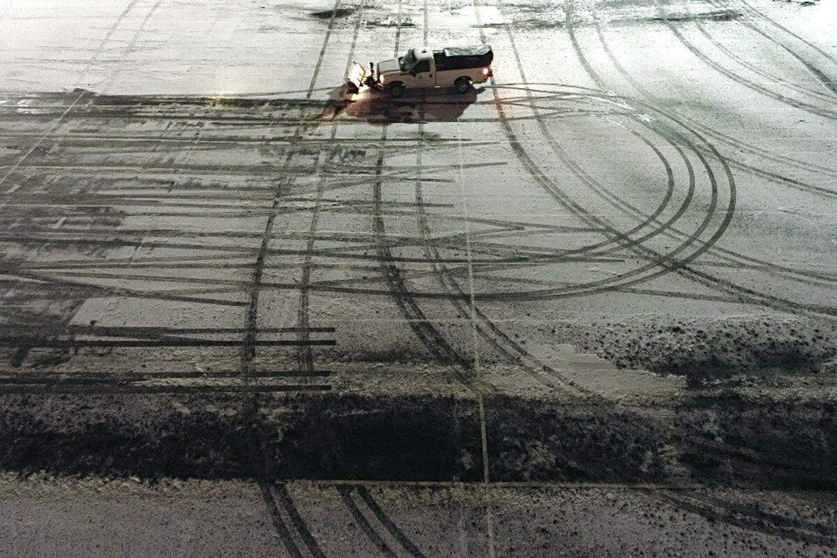 A winter storm left behind layers of ice, sleet and snow for many residents across Kentucky on Friday.