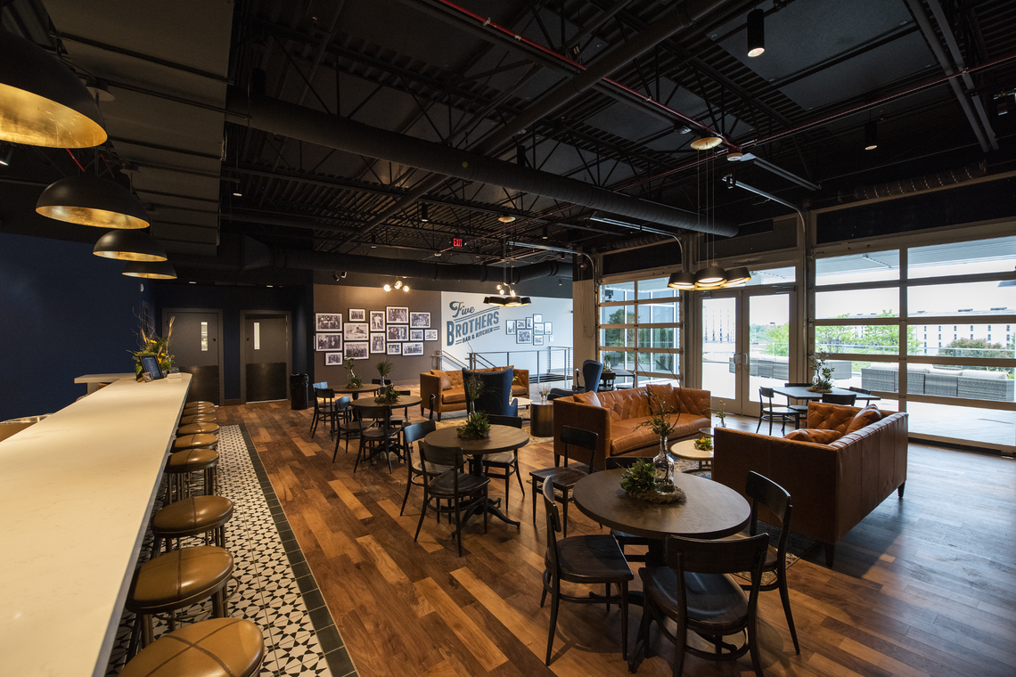 The Five Brothers lounge is next to the outdoor deck overlooking Heaven Hill Distillery’s Bardstown campus, with rows of rickhouses full of aging bourbons.