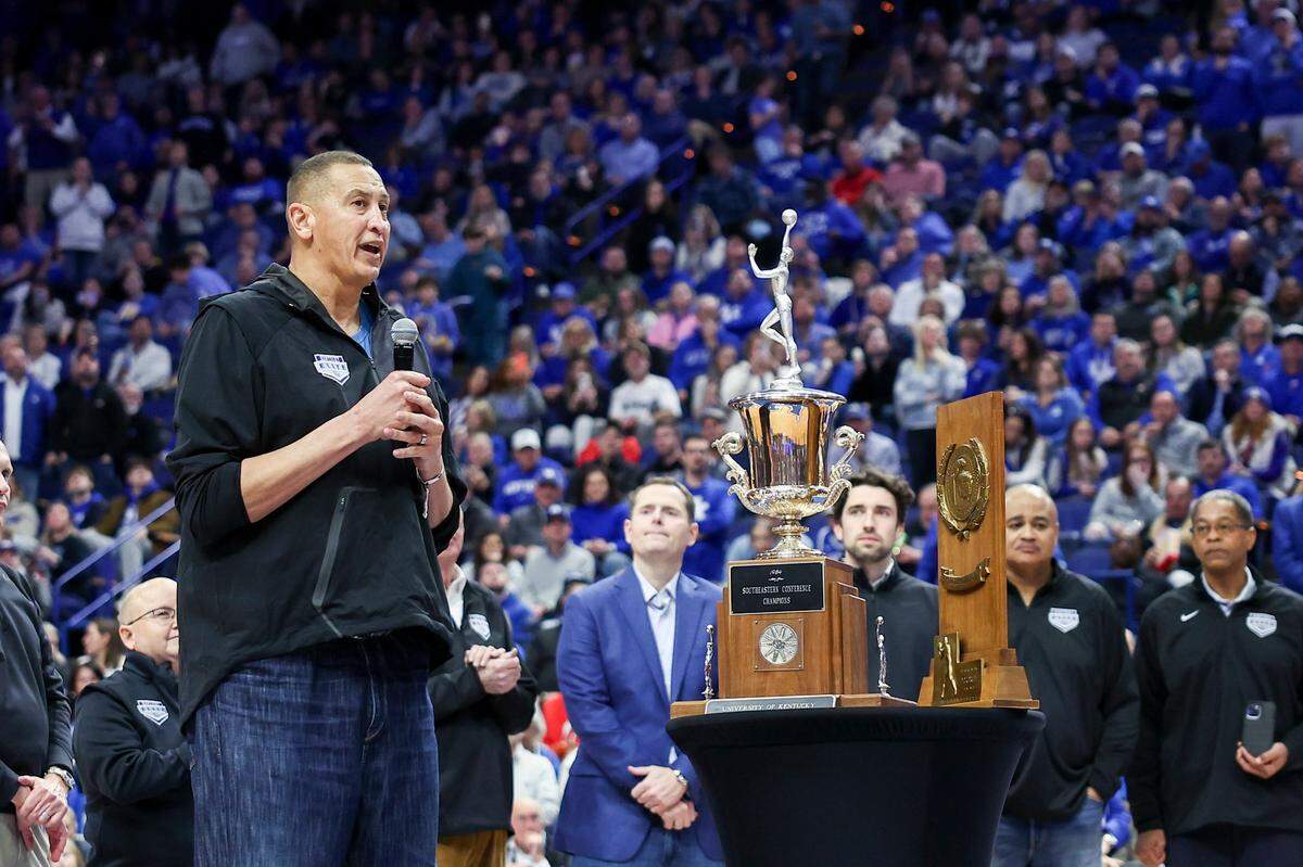 Former Kentucky basketball star Sam Bowie speaks at halftime of the UK-Georgia game while the 1983-84 team is honored.